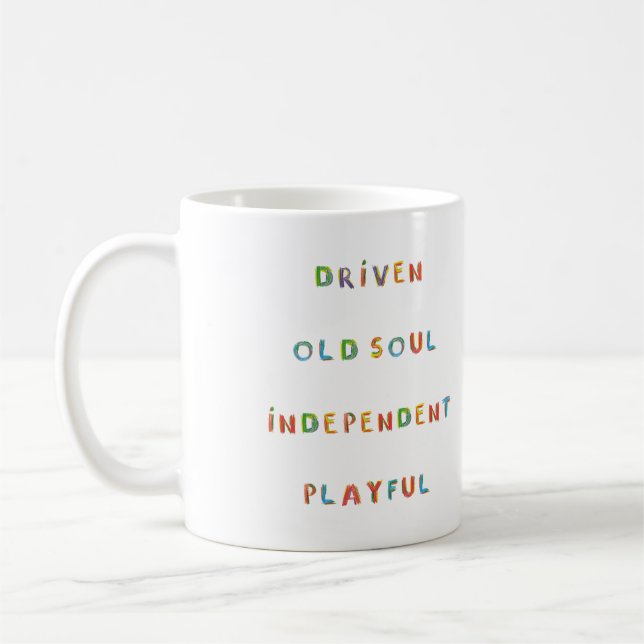 Steinbock-Innenkind-Zodiakastrologie Kaffeetasse (Links)