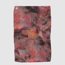 Steine in roten Farbtönen auf schwarz-grauem Hinte Golfhandtuch