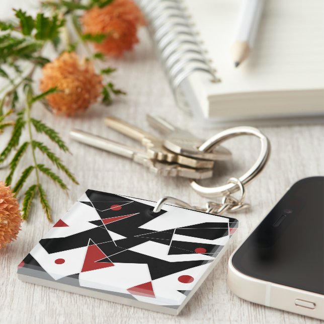 Stellen Sie die rote Bälle auf der Acrylglasriegel Schlüsselanhänger (Vorderseite rechts)