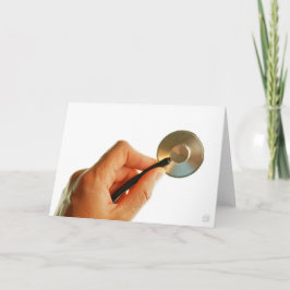 Stethoscoop in een hand voor een ziekenhuis sfeer. dankeskarte