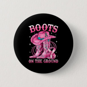 Stiefel auf dem Western Cowgirl Brustkrebs am Bode Button