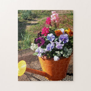 Stiefmütterchen-Blumen und Gießkanne Foto Puzzle