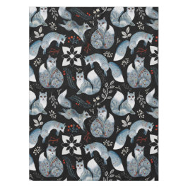 Stilisierte blaue Füchse mit aufwendigen floralen  Tischdecke