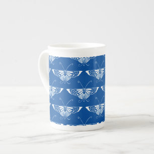 stilisierter Art Deco Schmetterling, kobaltblau un Prozellantasse