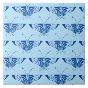 Stilisierter Deko-Schmetterling - Kobalt und blass Fliese