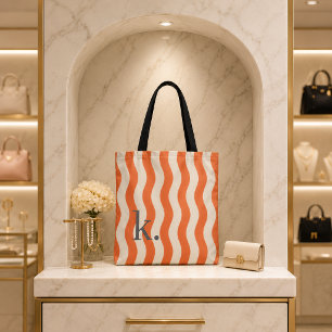 Stilvolle orange Wellenstreifen mit Ihrem Monogram
