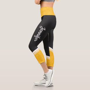 Stilvolle, schwarz-gelbe, blumenweiße Streifen und Capri Leggings