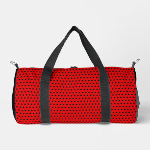 Stilvolle, schwarze Punktmuster auf dem roten Stre Duffle Bag