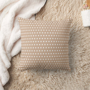 Stilvolle weiße Polka-Punkte auf klassisch beige Kissen