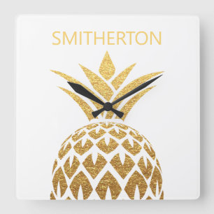 Stilvoller goldener Ananas weißer Familienname Quadratische Wanduhr