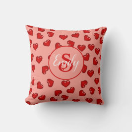 Stilvolles rotes Herzmuster auf pfirsichrosa monog Kissen