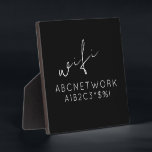 Stilvolles WLAN-Passwort-Zeichen schwarz Fotoplatte<br><div class="desc">Nie wieder müssen Ihre Gäste mit diesem eleganten WiFi-Passwort für das WiFi-Passwort gefragt werden. Das schwarze Plakatdesign ergänzt jede Dekoration und die weiße Schrift macht das Passwort leicht lesbar. Diese 5.25x5.25-Gedenktafel ist mit einer einfachen Einlage ausgestattet, um sie in Ihrer Zuhause, im Büro oder im Unternehmen leicht zu sehen. Passen...</div>