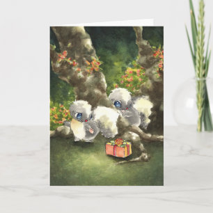 Stinktiere mit einem Geschenk Karte