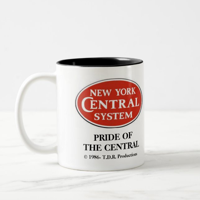 Stolz des Central Mug Zweifarbige Tasse (Links)