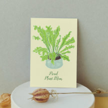 Stolze Pflanze Mama - Vogelnest-Farn auf Orange.