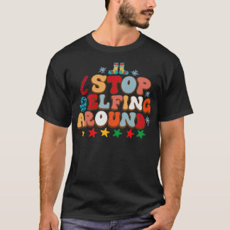 Stoppen Sie Elfing um Vintagen T-Shirt