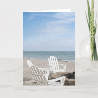 Strandhaus mit Liegestühlen und Sonnenschirmen Karte
