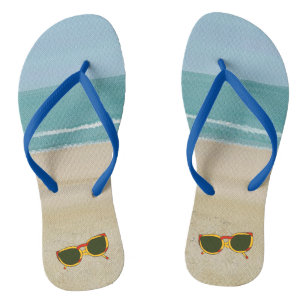 Strandsand Ozean Himmel Sonnenbrille FlipFlops