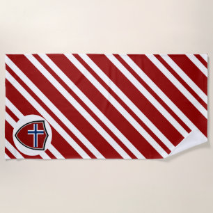Strandtuch unter norwegischer Flagge