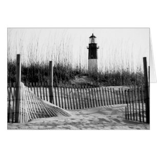 Strandzäune und Leuchtturm