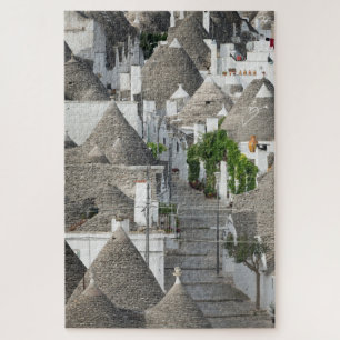 Straße mit trulli Häusern in Alberobello, Puglia Puzzle