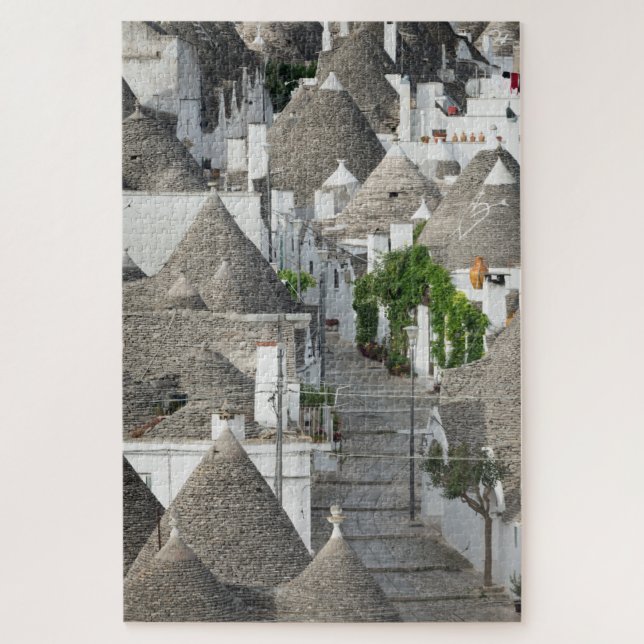 Straße mit trulli Häusern in Alberobello, Puglia Puzzle (Vertikal)