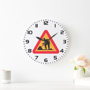 Straßenbauarbeiten vor Schilderbauzone - Warnung Große Wanduhr