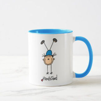 Strichmännchen-Mädchen, das Handstands-Tassen tut Tasse