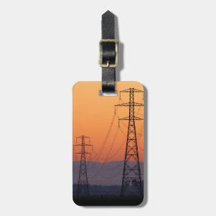 Strommasten bei Sonnenuntergang Gepäckanhänger