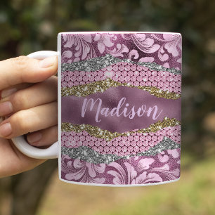 Stylischer floraler glitzernder lila rosa goldener kaffeetasse