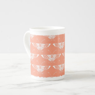 Stylized Deco butterfly - orangefarbene Coral Prozellantasse
