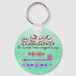 Suchen nach, verpackt in einen Song-Schlüsselanhän Schlüsselanhänger