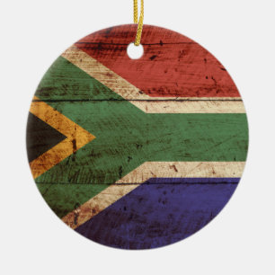 Südafrika-Flagge auf altem Holzmaserung Keramikornament