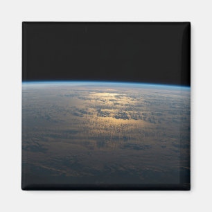 Sunglint strahlt aus einem teilweise bewölkten Süd Magnet