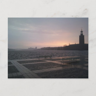 Sunset in rain over Stockholm City Hall Postkarte