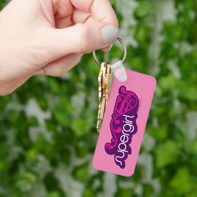 Supergirl Groovy Name und S-Shield Schlüsselanhänger (Hand)