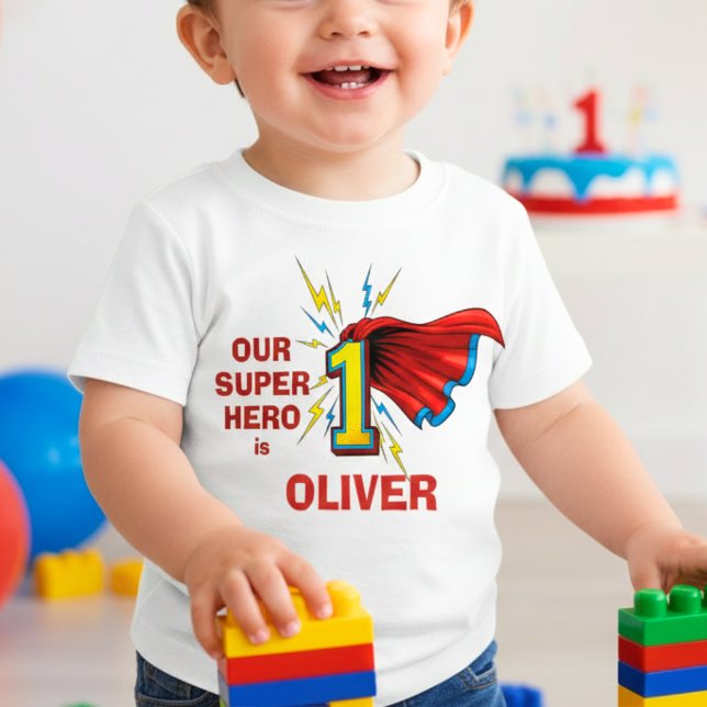 Superhero Number 1 with Cape First Birthday Baby T-shirt (Von Creator hochgeladen)