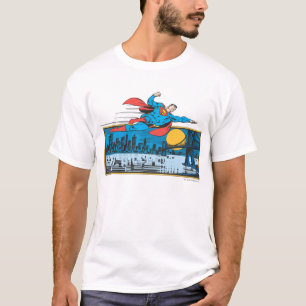 Superman fliegt über die Stadt T-Shirt