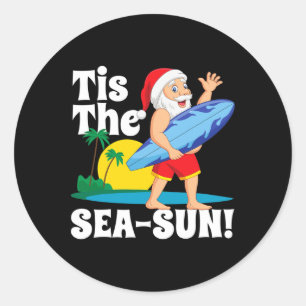 Surfen Santa ist das Meer-Sonne Weihnachten im Jul Runder Aufkleber