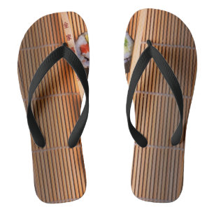 Sushi und hölzerne Essstäbchen Flip Flops