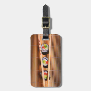 Sushi und hölzerne Essstäbchen Gepäckanhänger