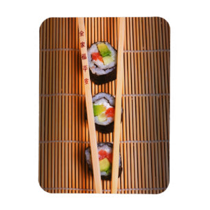 Sushi und hölzerne Essstäbchen Magnet