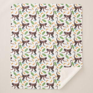 Süße Affen, die Bananen schuggeln Sherpadecke