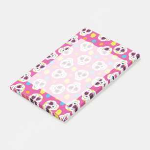 Süße bunte Zuckerschädel auf Rosa Post-it Klebezettel