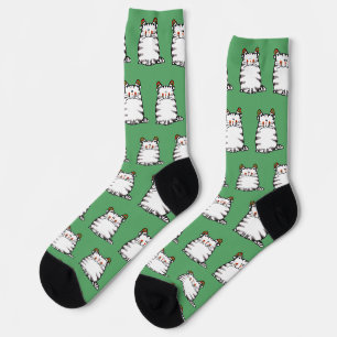 Süße dicke Katze mit zwei Weihnachtsmützen Socken