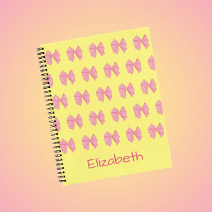 Süße gelbe und rosa Schleifen Muster Mädchenname Notizbuch