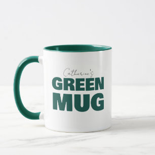 Süße grüne Tasse mit individuellem Namen im Schrif