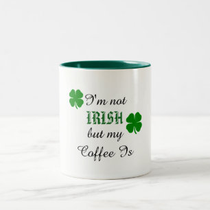 Süße grüne und weiße irische Kaffeetasse
