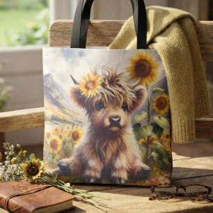 Süße Highland-Kuh mit Sonnenblumen