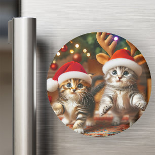 Süße Kätzchen mit Weihnachtsmann und Rentierhüten Magnet
